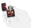 Anne Stokes Sinister Clown Windproof Lighter lit in hand