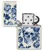 Zippo lighter glows in the dark skull with crown surrounded by blue flowers opened without flame