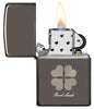 Good Luck Design Black Ice Windproof Lighter with its lid open and lit