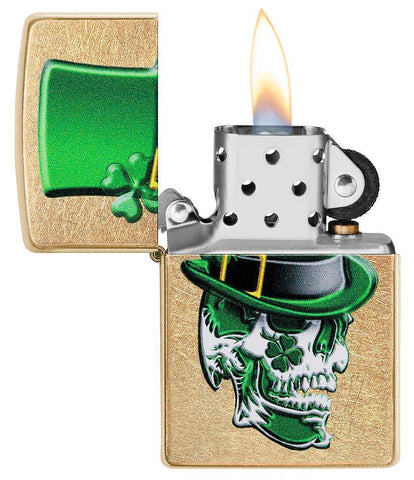 Irish Skull Design Gold Dust Windproof Lighter with its lid open and lit