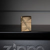 Lifestyle image of Zippo Design Windproof Lighter standing on a metal Zippo stand
