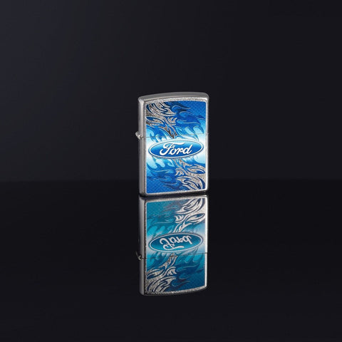 Lifestyle image of Ford Flame Logo Street Chrome™ Windproof Lighter standing in a black reflective background
