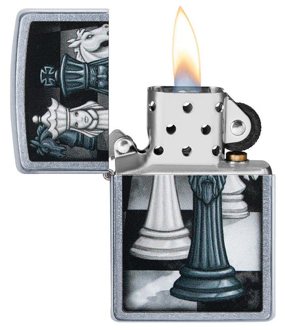 Chess Game Design Street Chrome™ Windproof Lighter with its lid open and lit