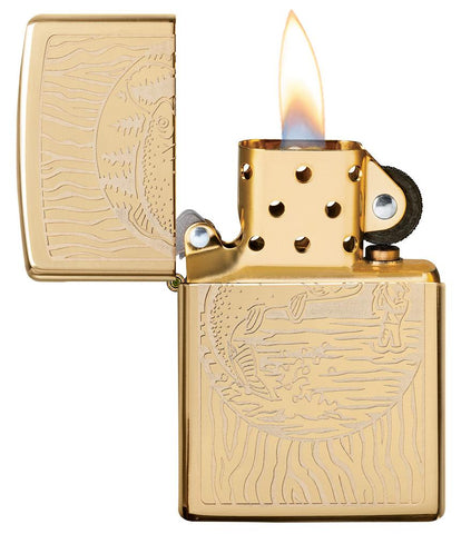 Fisherman Design High Polish Brass Windproof Lighter with its lid open and lit