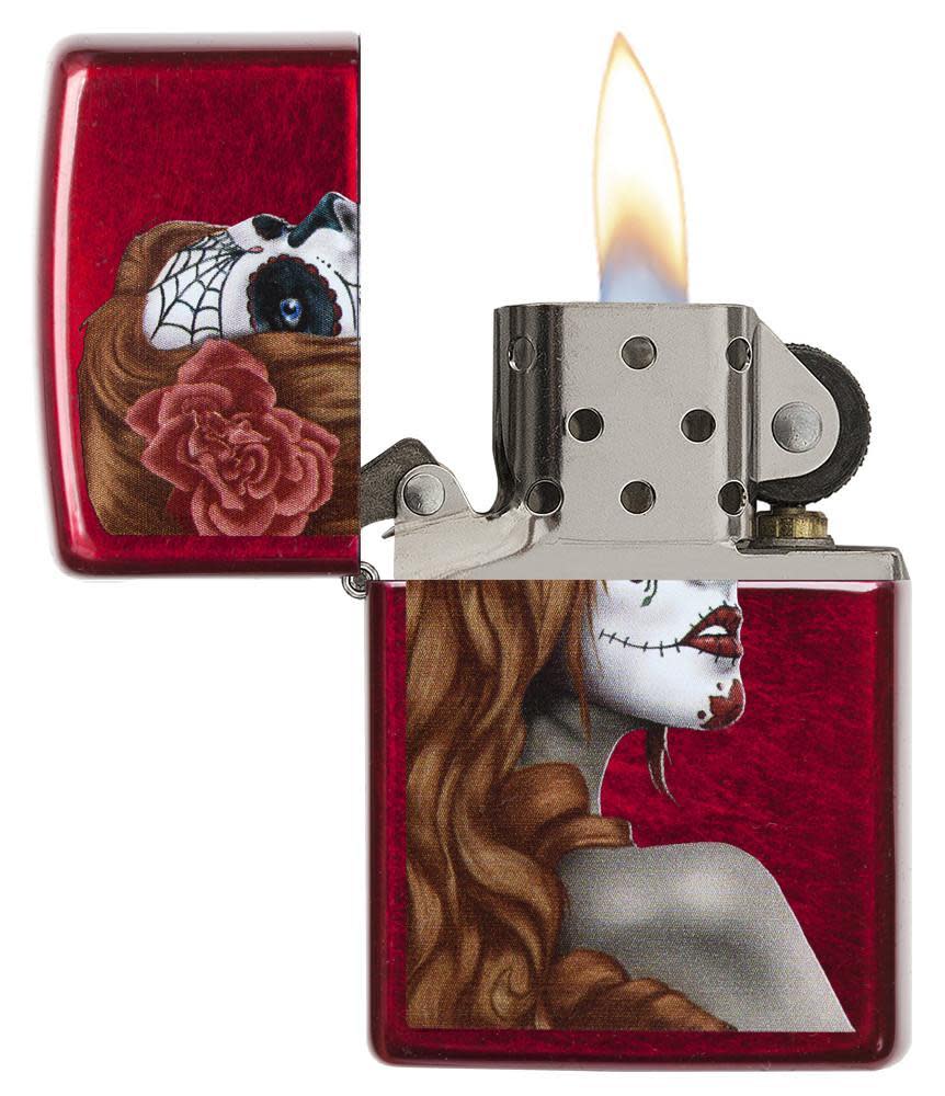 Dia De Los Muertos Candy Apple Red Windproof Lighter with its lid open and lit