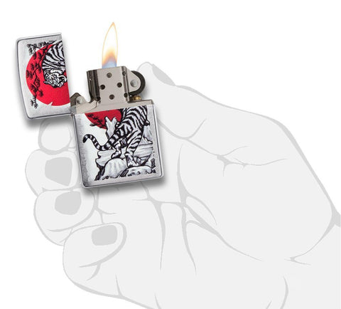 Asian Tiger Brushed Chrome Windproof Lighter with its lid open and lit