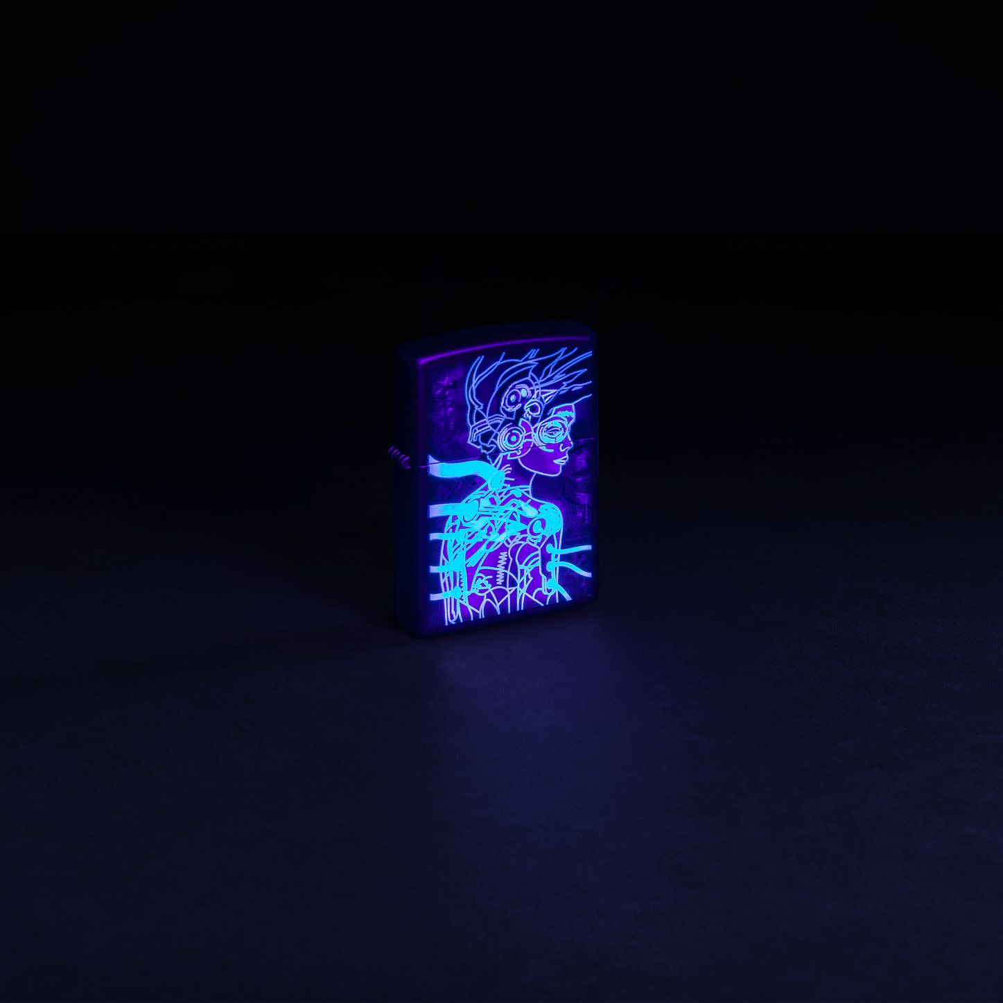 Glamour shot of Zippo Black Light Cyber Woman Design Black Matte Windproof Lighter glowing with a black light.