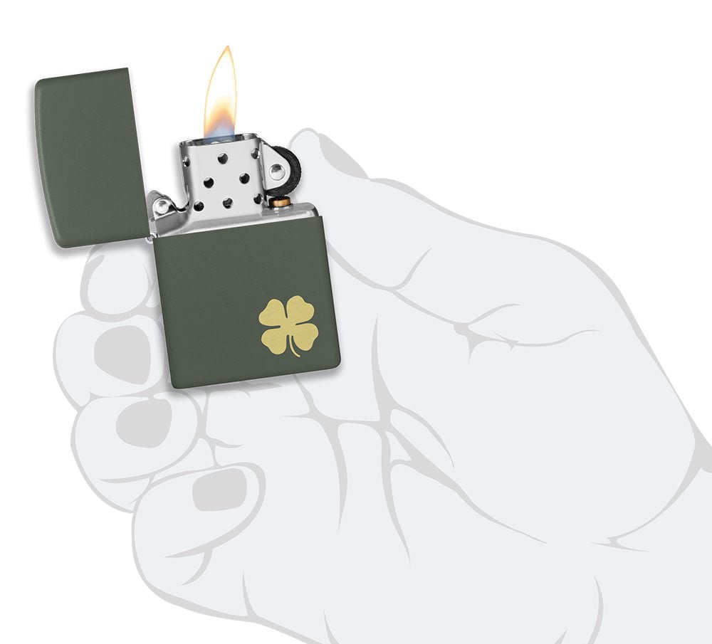 Four Leaf Clover Green Matte Windproof Lighter lit in hand.