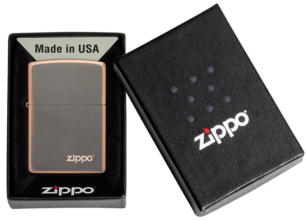 Classic Rustic Bronze Zippo Logo Windproof Lighter in its packaging.