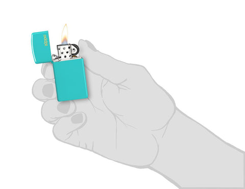 Zippo Slim Flat Turquoise Zippo Logo Pocket Lighter lit in hand.