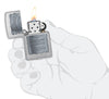 Jack Daniel's Silver Logo Street Chrome Windproof Lighter lit in hand.