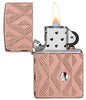 Geometric Diamond Pattern Design Armor® Rose Gold Windproof Lighter with its lid open and lit.